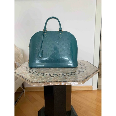 Alma leather handbag Louis Vuitton Turquoise in Leather - 26835614