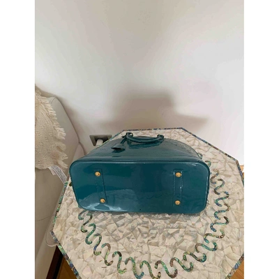 Louis Vuitton Alma Bb Turquoise Patent Leather Handbag (Pre-Owned)