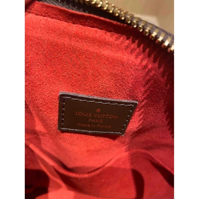 Pre-owned Louis Vuitton Brown Cloth Handbags