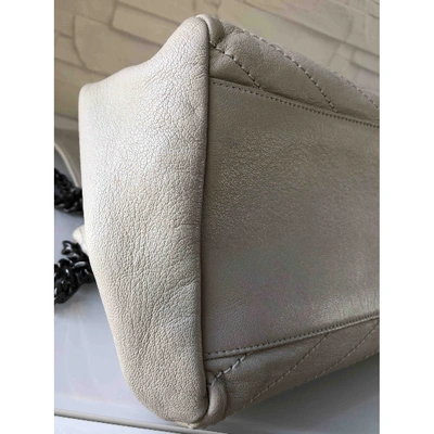 Pre-owned Saint Laurent Nolita Leather Handbag In Beige