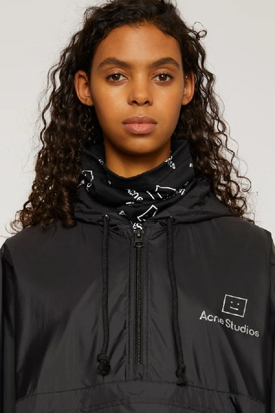 Shop Acne Studios Reflective Face Motif Poncho Black