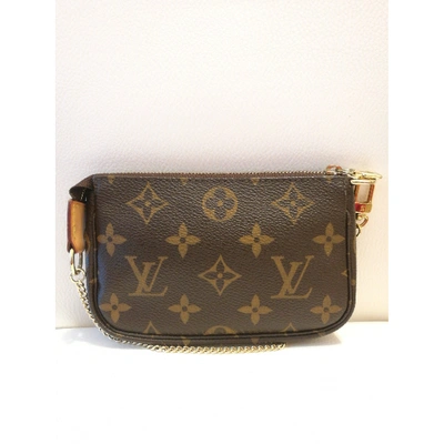 Pre-owned Louis Vuitton Pochette Accessoire Brown Cloth Clutch Bag