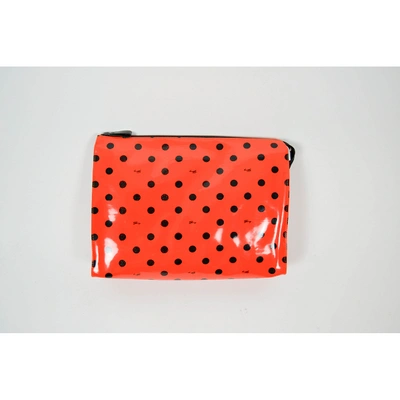 Pre-owned Genny Patent Leather Clutch Bag In Orange