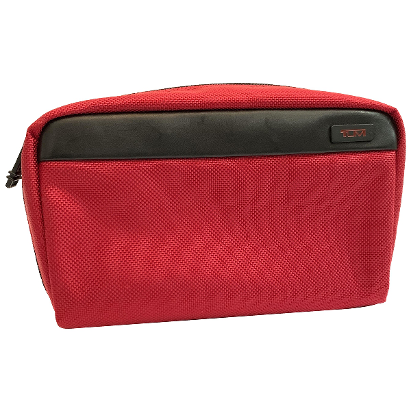 tumi clutch bag