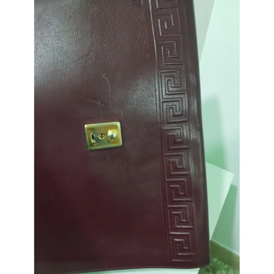 VERSACE Pre-owned Leather Clutch Bag In Burgundy