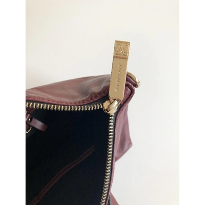 Pre-owned Coccinelle Leather Handbag In Burgundy