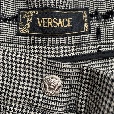 Pre-owned Versace Wool Large Pants In Black