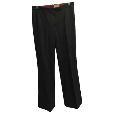 Pre-owned John Richmond Trousers In Black