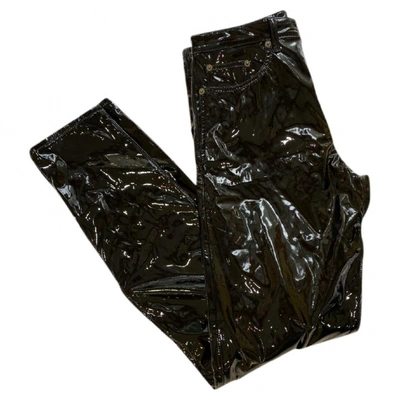 Pre-owned Saint Laurent Black Spandex Trousers