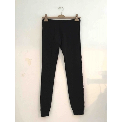 Pre-owned Alexander Mcqueen Black Synthetic Trousers
