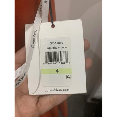 Pre-owned Calvin Klein Mid-length Dress In Orange