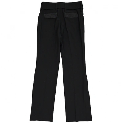 Pre-owned Dolce & Gabbana Wool Trousers In Black