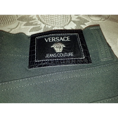 Pre-owned Versace Straight Jeans In Green