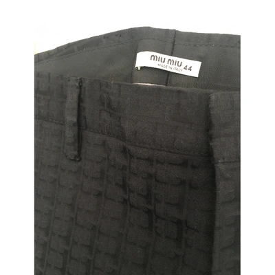 Pre-owned Miu Miu Trousers In Black