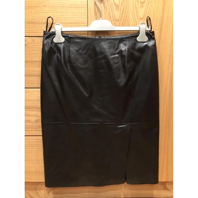 Pre-owned Moschino Cheap And Chic Leather Mid-length Skirt In Black