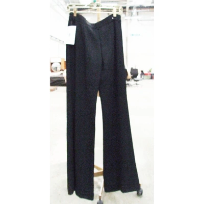 Pre-owned Emanuel Ungaro Trousers In Black