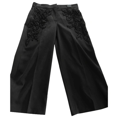 Pre-owned Alexander Mcqueen Wool Trousers In Black