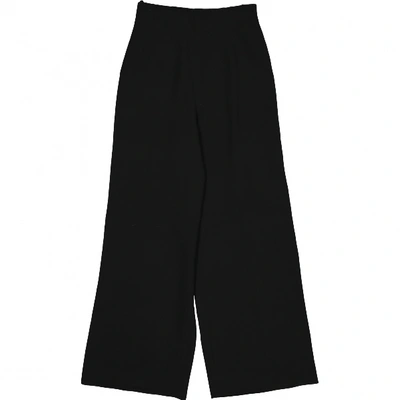 Pre-owned Montana Silk Large Trousers In Black