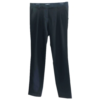Pre-owned Maje Trousers In Black