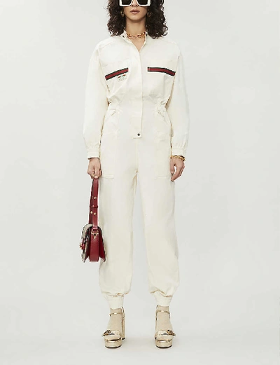 Shop Gucci Embroidered Stripe-trim Cotton Jumpsuit In Ivory+multicolor