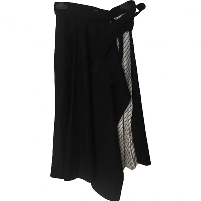 Pre-owned Carven Wool Mid-length Skirt In Black