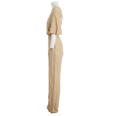 Pre-owned Valentino Silk Jumpsuit In Beige