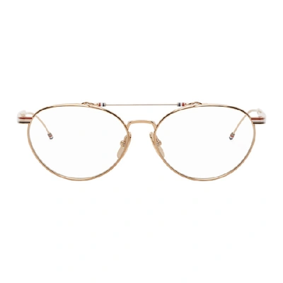 Shop Thom Browne Gold Round Metal Glasses In White Gold