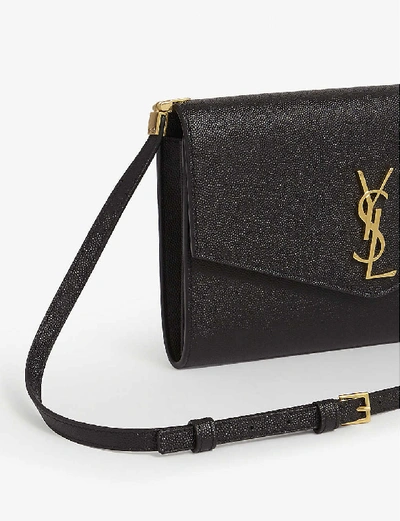 Shop Saint Laurent Uptown Grained Leather Cross-body Bag In Black Gold