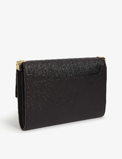 Shop Saint Laurent Uptown Grained Leather Cross-body Bag In Black Gold