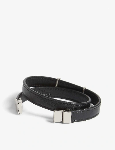 Shop Saint Laurent Logo Leather Wrap Bracelet In Black Silver