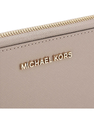 Shop Michael Michael Kors Leather Wristlet In Soft Pink