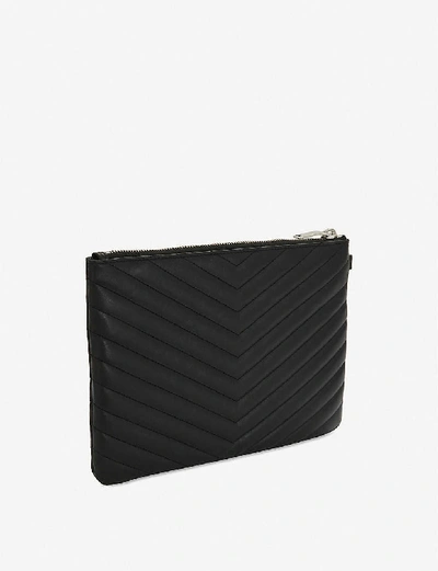 Shop Saint Laurent Monogram Quilted-leather Pouch In Black