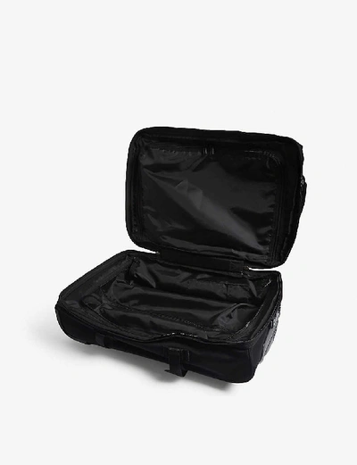 Shop Eastpak Tranverz S Suitcase 51cm In Black