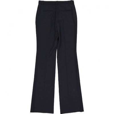 Pre-owned Roberto Cavalli Wool Trousers In Blue