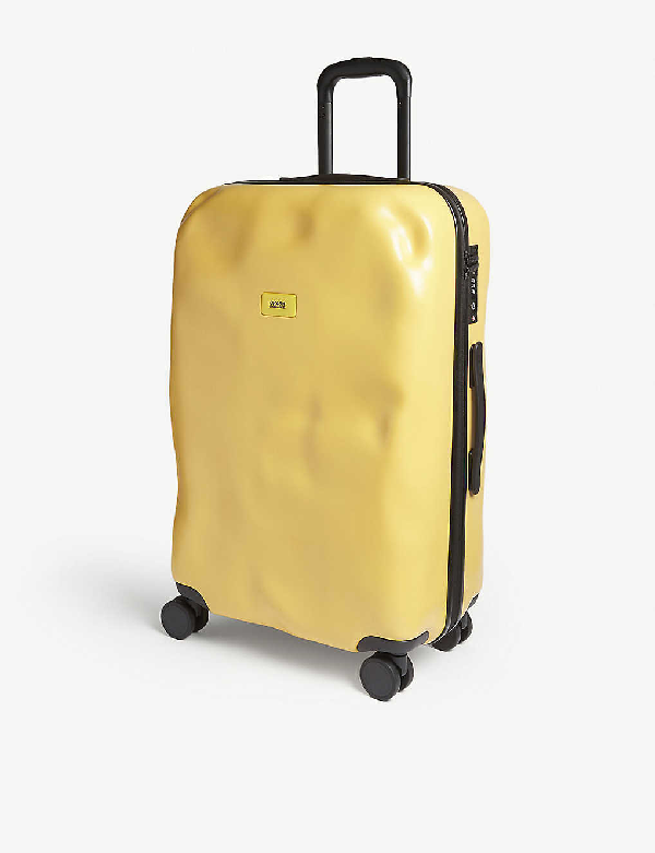 mustard yellow luggage