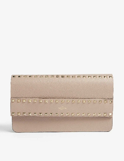 Shop Valentino Rockstud Rowstud Leather Clutch In Poudre