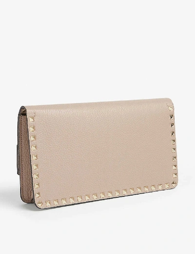 Shop Valentino Rockstud Rowstud Leather Clutch In Poudre