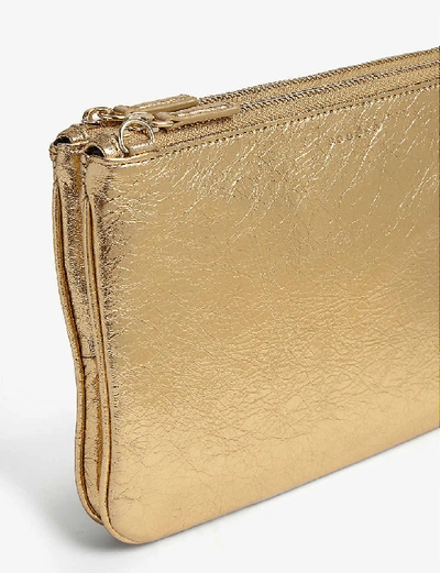 Shop Sandro Metallic Addict Pouch Bag In Full Gold