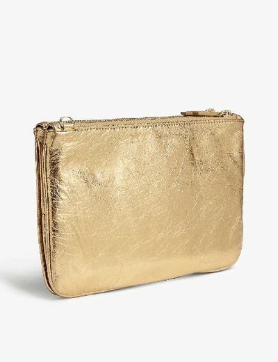 Shop Sandro Metallic Addict Pouch Bag In Full Gold