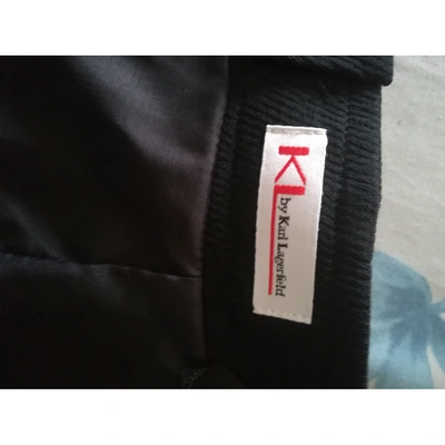 Pre-owned Karl Lagerfeld Wool Mid-length Skirt In Black