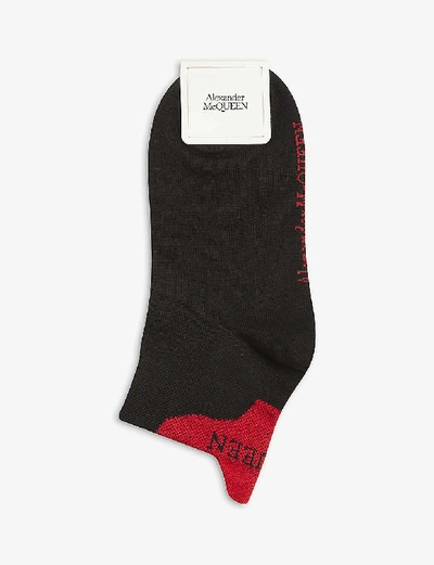 Shop Alexander Mcqueen Logo Tab Ankle Socks In Black+white