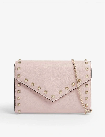 Shop Valentino Rockstud Leather Cross-body Bag In Poudre