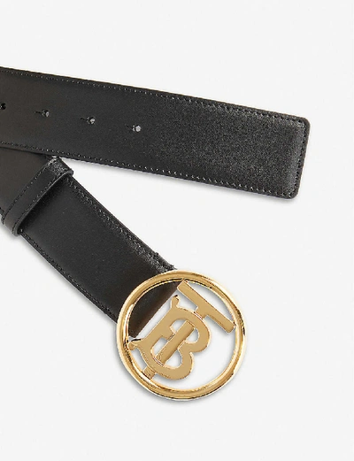 Shop Burberry Monogram Buckle Leather Belt In Black/gold