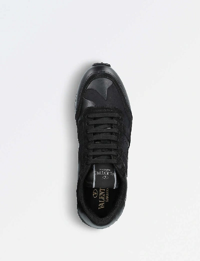 Camouflage-print leather trainers