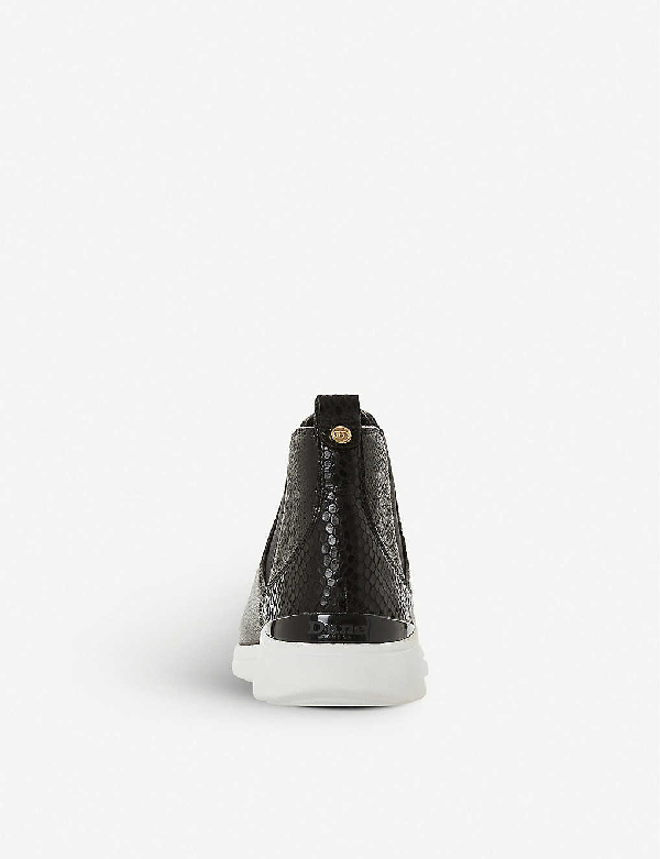 black leather trainer boots