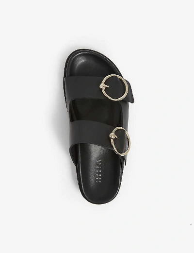 Shop Claudie Pierlot Aroundye Buckle-embellished Leather Sandals In Black