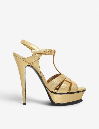 Shop Saint Laurent Women's Gold Tribute Leather Heeled Sandals