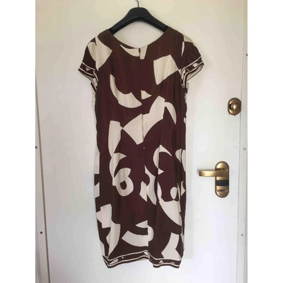 Pre-owned Genny Silk Mid-length Dress In Brown