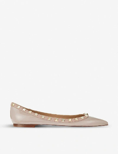 Shop Valentino Rockstud Patent-leather Flats In Nude (nude)