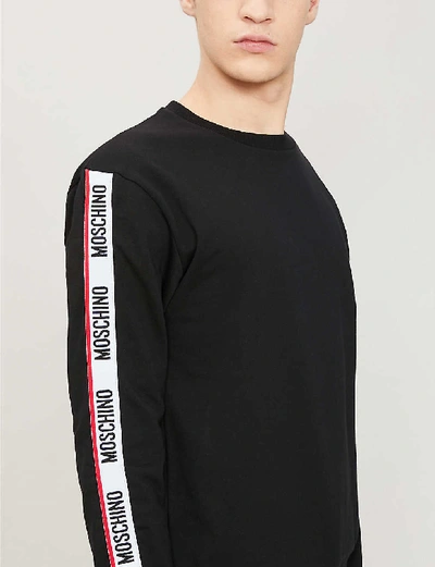 Shop Moschino Logo-tape Cotton-jersey Sweatshirt In Black